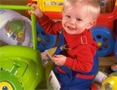 Child with lots of toys