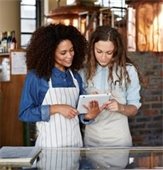 woman signing her name