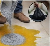 man cleaning up cooking oil spill with cat litter and then throwing that in the garbage