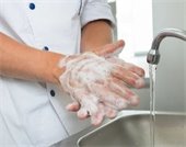 A person washing hands