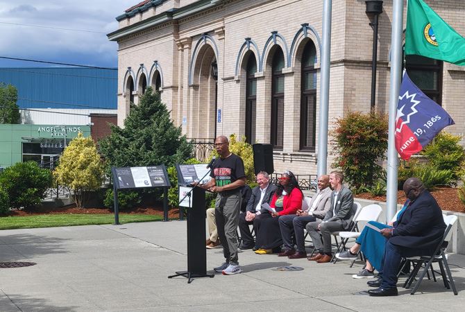 Image of Senator John Lovick speaking at the 2025 Juneteenth flag raising at Snohomish County campus