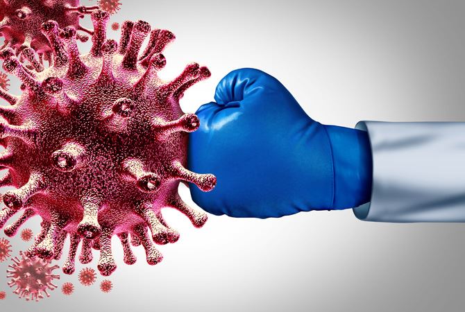 Image of a boxing glove punching a virus